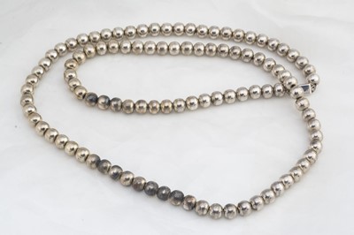 Lot 241 - A contemporary silver bead necklace