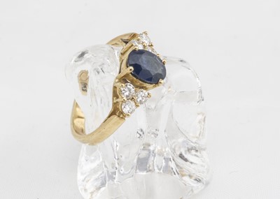 Lot 251 - A continental yellow metal sapphire and diamond dress ring