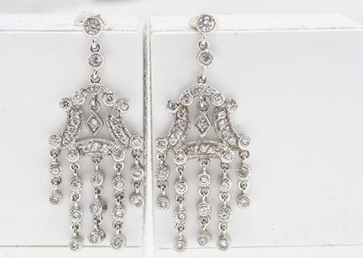 Lot 262 - A pair of cz and silver chandelier drop earrings