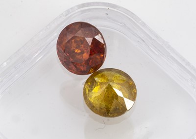 Lot 278 - Two certificated sphalerite round cut gems