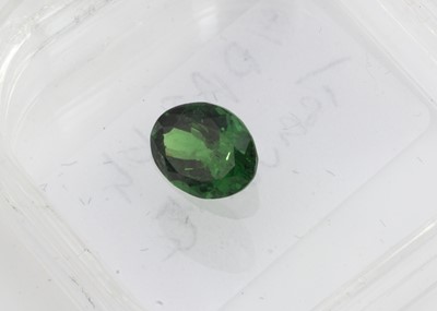 Lot 281 - A certificated mixed oval cut  green garnet