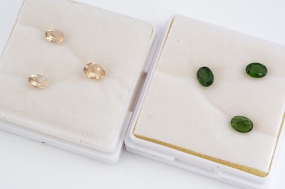 Lot 306 - Two gem cases containing three oval and pear cuts gems