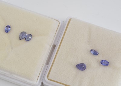 Lot 309 - Two gem cases containing three oval and pear cut tanzanites