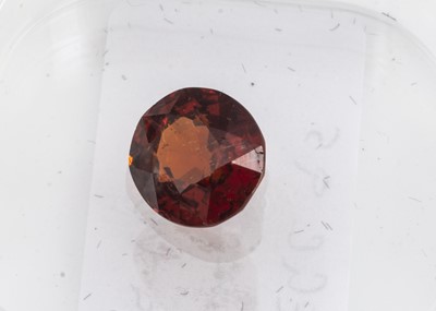 Lot 325 - A certificated oval cut Garnet