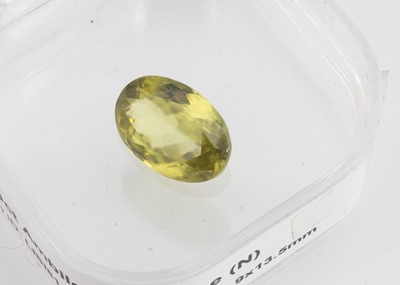 Lot 336 - A certificated oval cut sphene