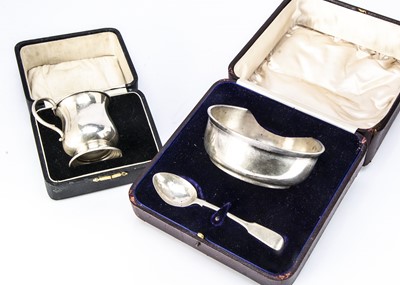 Lot 383 - Two cased George V silver Christening items