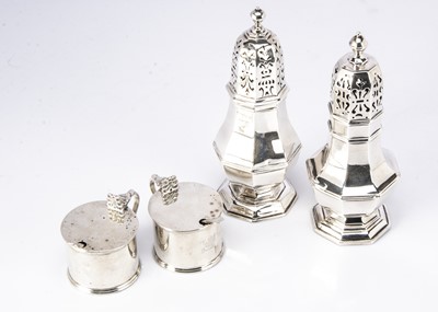 Lot 389 - Two George V silver sugar sifters and a pair of silver mustards