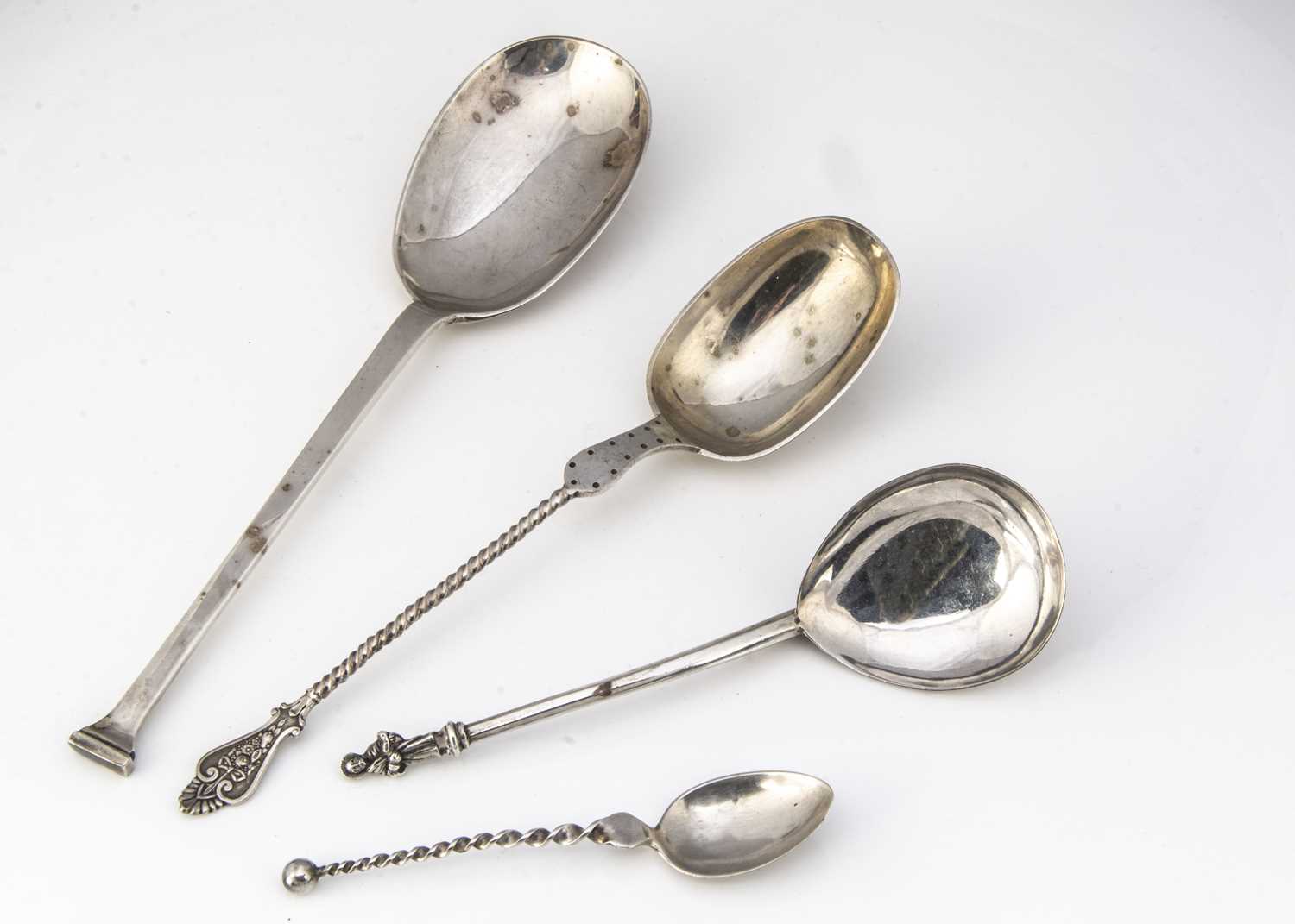 Lot 399 - Four various silver spoons,