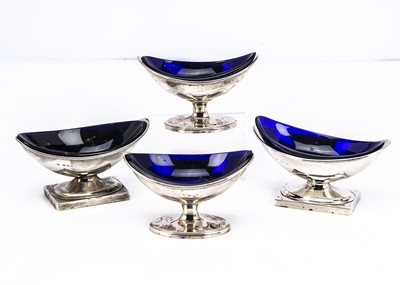 Lot 407 - Two pairs of silver helmet shaped salts with blue glass liners