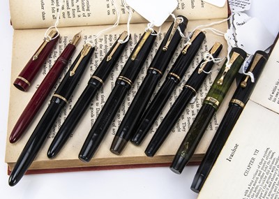 Lot 446 - Nine vintage Parker fountain pens