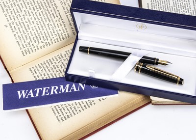 Lot 477 - A modern boxed Waterman black and gilt fountain pen