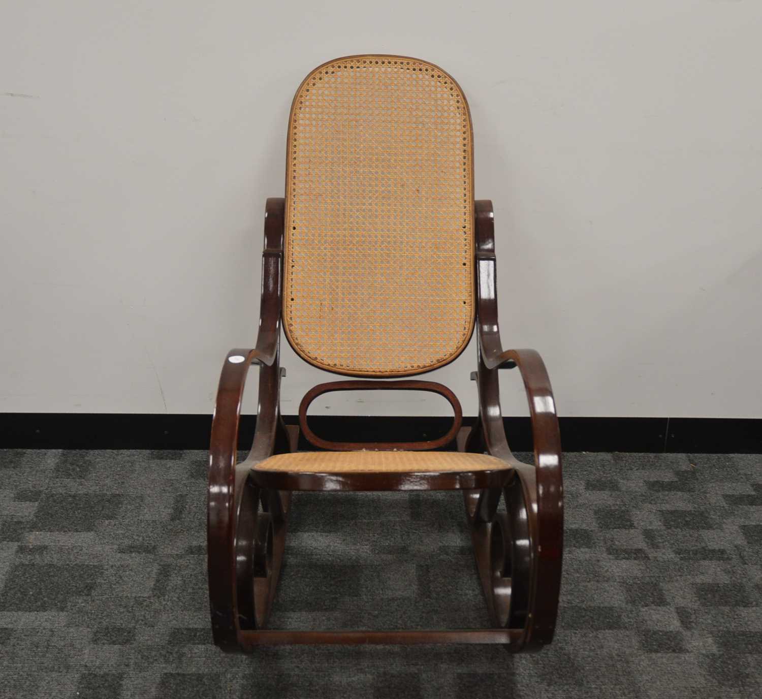 Lot 3 - A late 20th century bent wood rocking chair