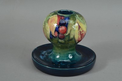 Lot 300 - An early 20th century Moorcroft pottery candlestick and dish