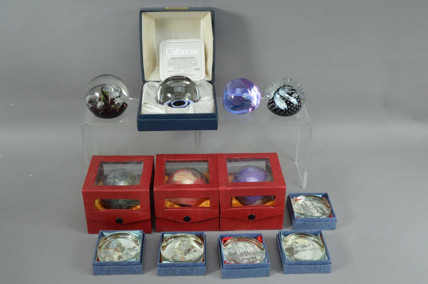 Lot 310 - A collection of glass paperweights