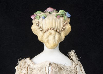 Lot 18 - A fine German bisque shoulder-head lady doll with flowers in hair