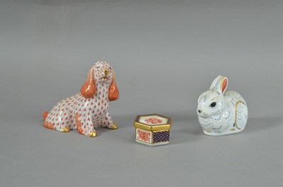 Lot 330 - A small Herend porcelain dog