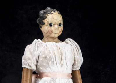Lot 26 - An unusual early 19th century English dipped wax over papier-mache shoulder-head doll