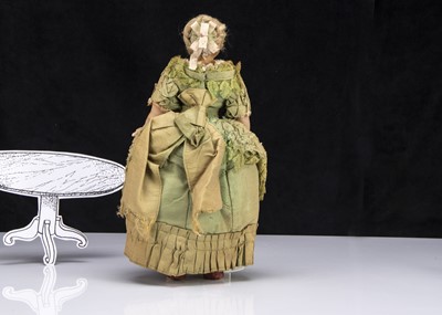 Lot 27 - A small Montanari poured wax shoulder-head child doll