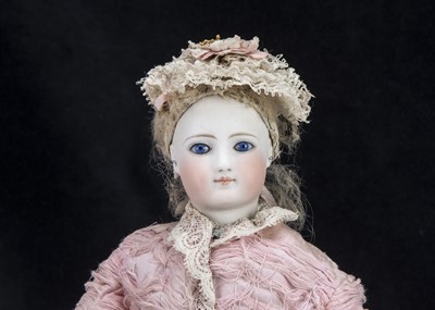 Lot 41 - A rare Simon & Halbig fashionable doll with twill covered wooden articulated body 1870s