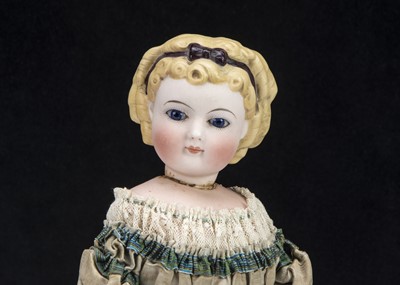Lot 45 - A rare Simon & Halbig bisque swivel headed glass eyed moulded hair lady doll