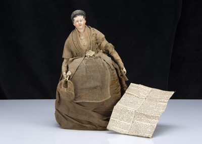 Lot 54 - A mid 19th century German papier-mache shoulder-head lady doll