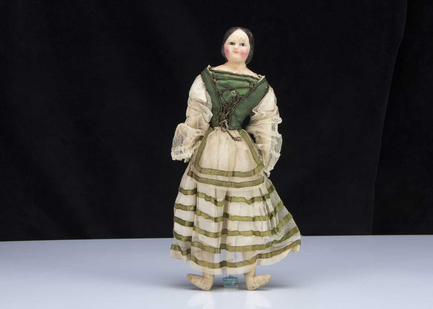 Lot 55 - A 19th century German papier-mache doll with dipped wax finish