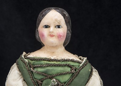 Lot 55 - A 19th century German papier-mache doll with dipped wax finish