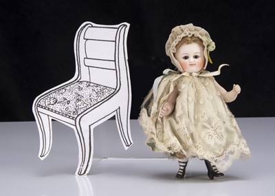 Lot 81 - A late 19th century small Kestner all-bisque swivel head pouty child doll