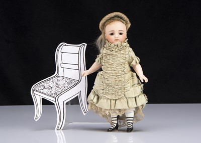 Lot 84 - A small all-bisque Simon & Halbig Mignonette swivel head child doll for the French market