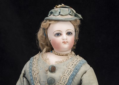 Lot 85 - A small Jumeau swivel headed fashionable doll