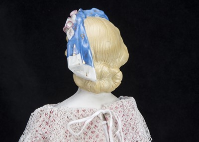 Lot 92 - A fine German bisque shoulder-head lady doll with flowers in hair