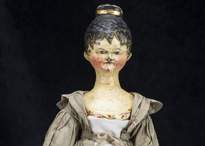 Lot 100 - A rare large Grodnerthal carved wooden doll with painted bodice trim 1820s