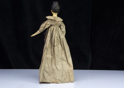 Lot 100 - A rare large Grodnerthal carved wooden doll with painted bodice trim 1820s