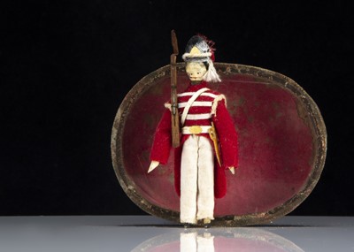 Lot 103 - A rare 19th century Grodnerthal dolls’ house British soldier doll