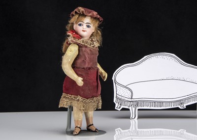 Lot 117 - A rare late 19th century French dolls’ house doll