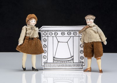 Lot 130 - A pair of German 1920s all-bisque dolls’ house dolls