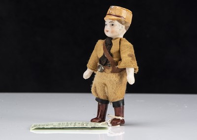 Lot 142 - A rare German all-bisque Brown Shirt (SA Sturmabteilung) dolls’ house doll