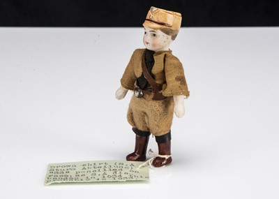 Lot 142 - A rare German all-bisque Brown Shirt (SA Sturmabteilung) dolls’ house doll