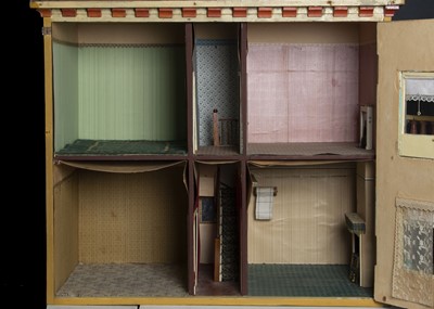 Lot 146 - A late 19th century painted wooden dolls’ house
