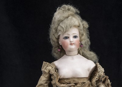 Lot 147 - A rare 19th century French pressed bisque swivel head fashionable doll bonbonniere