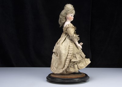 Lot 147 - A rare 19th century French pressed bisque swivel head fashionable doll bonbonniere