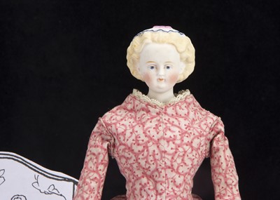 Lot 163 - A rare small German 19th century bisque shoulder head doll with moulded cap