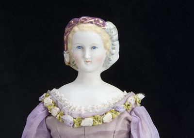 Lot 164 - A 19th century German bisque shoulder head doll known as Empress Eugenie