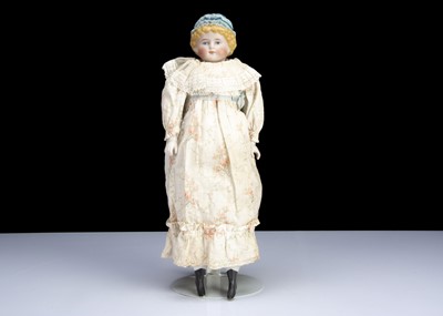 Lot 169 - A German 1054 bisque shoulder head doll with moulded hat