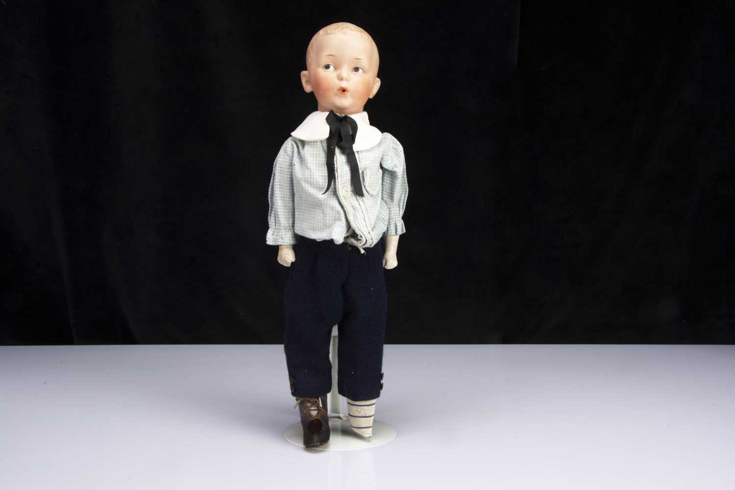 Lot 173 - A Gebruder Heubach 8774 Whistling Jim character boy