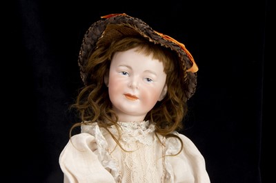 Lot 174 - A rare Armand Marseille painted eye character girl doll circa 1910