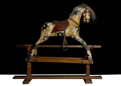 Lot 181 - A small early 20th century English carved and painted wooden rocking horse