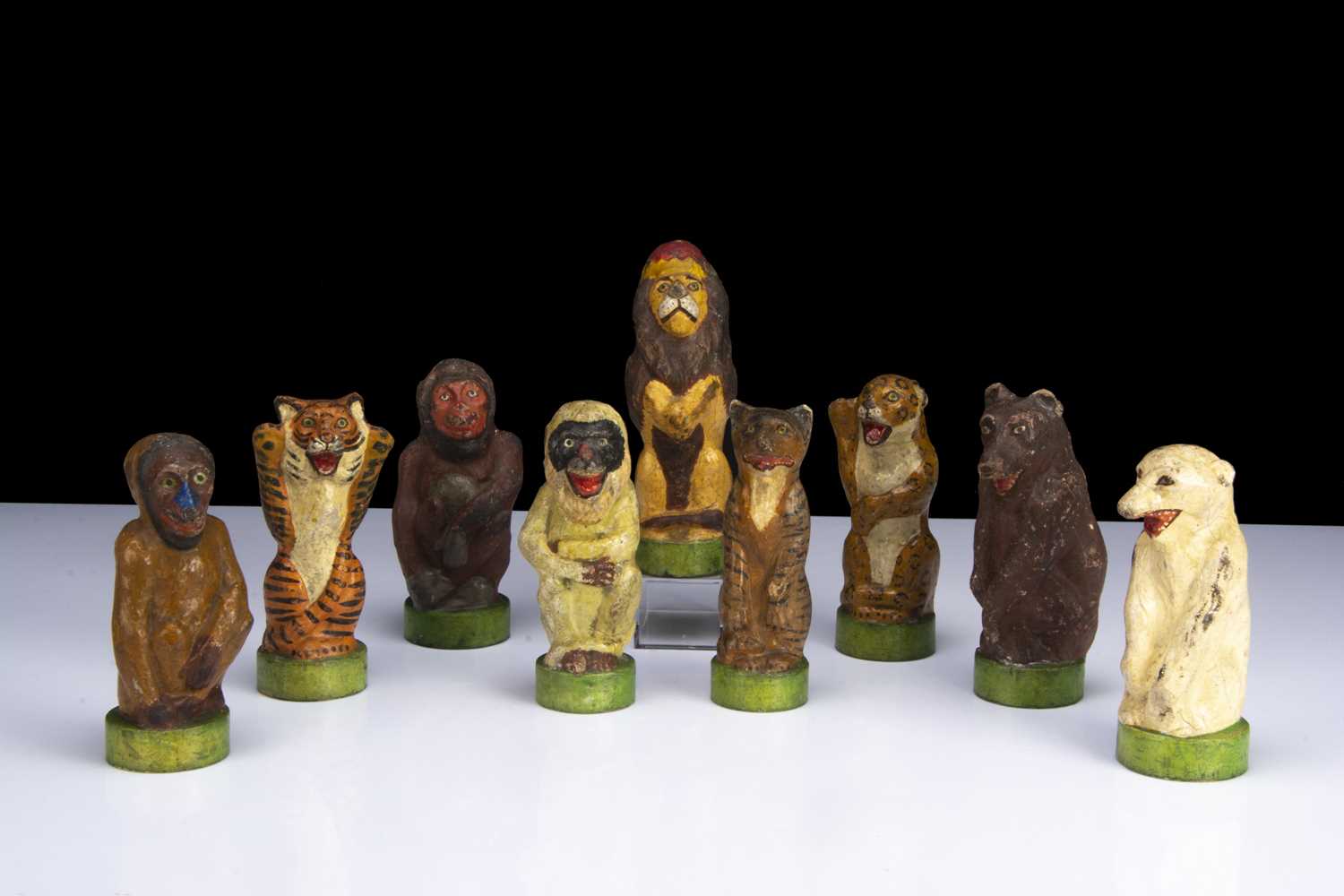 Lot 183 - Late 19th century papier-mache wild animal skittles