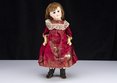 Lot 199 - A German bisque headed closed mouth doll marked 630