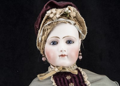 Lot 202 - A large Portrait Jumeau pressed bisque swivel head fashionable doll
